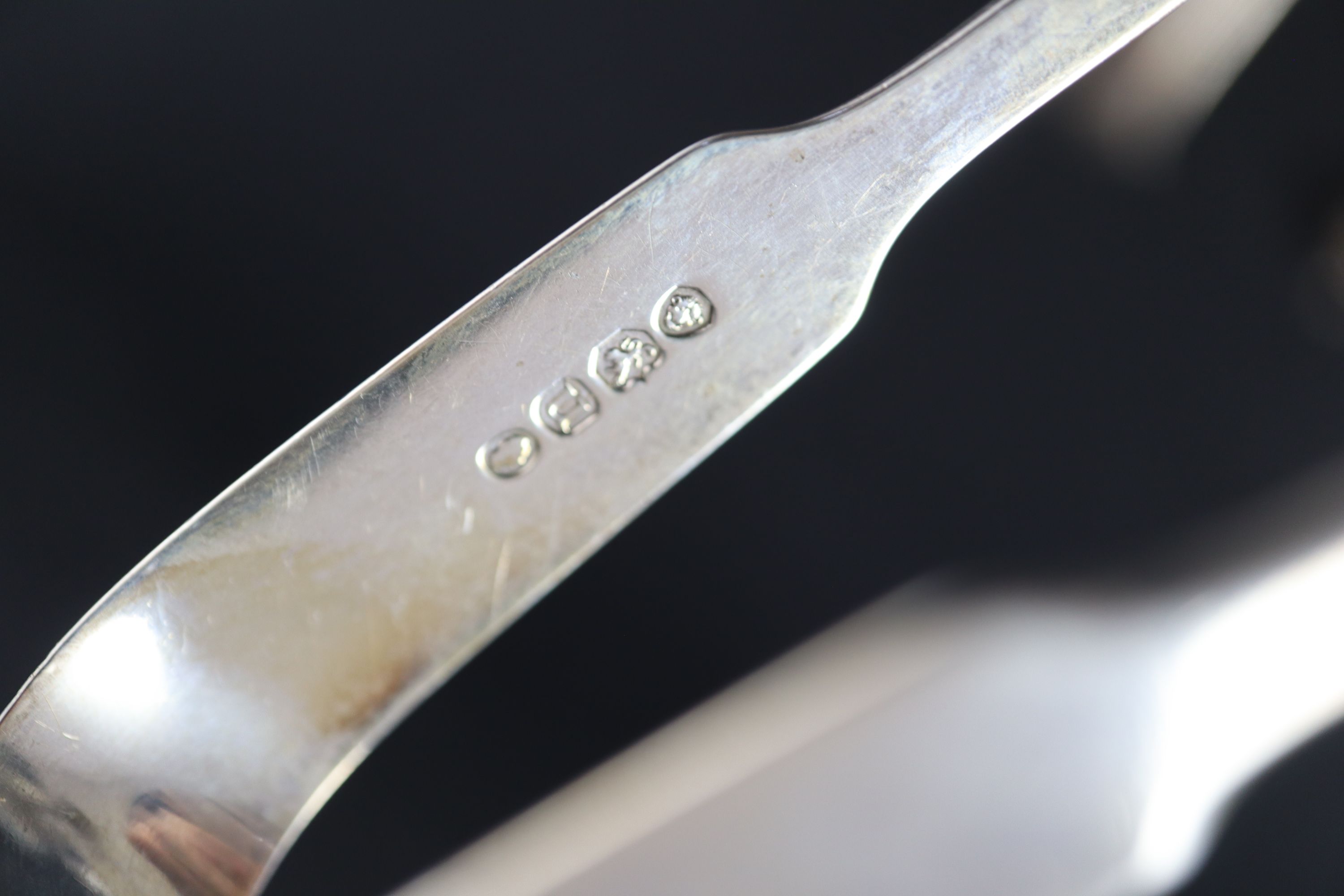 A group of mixed flatware: